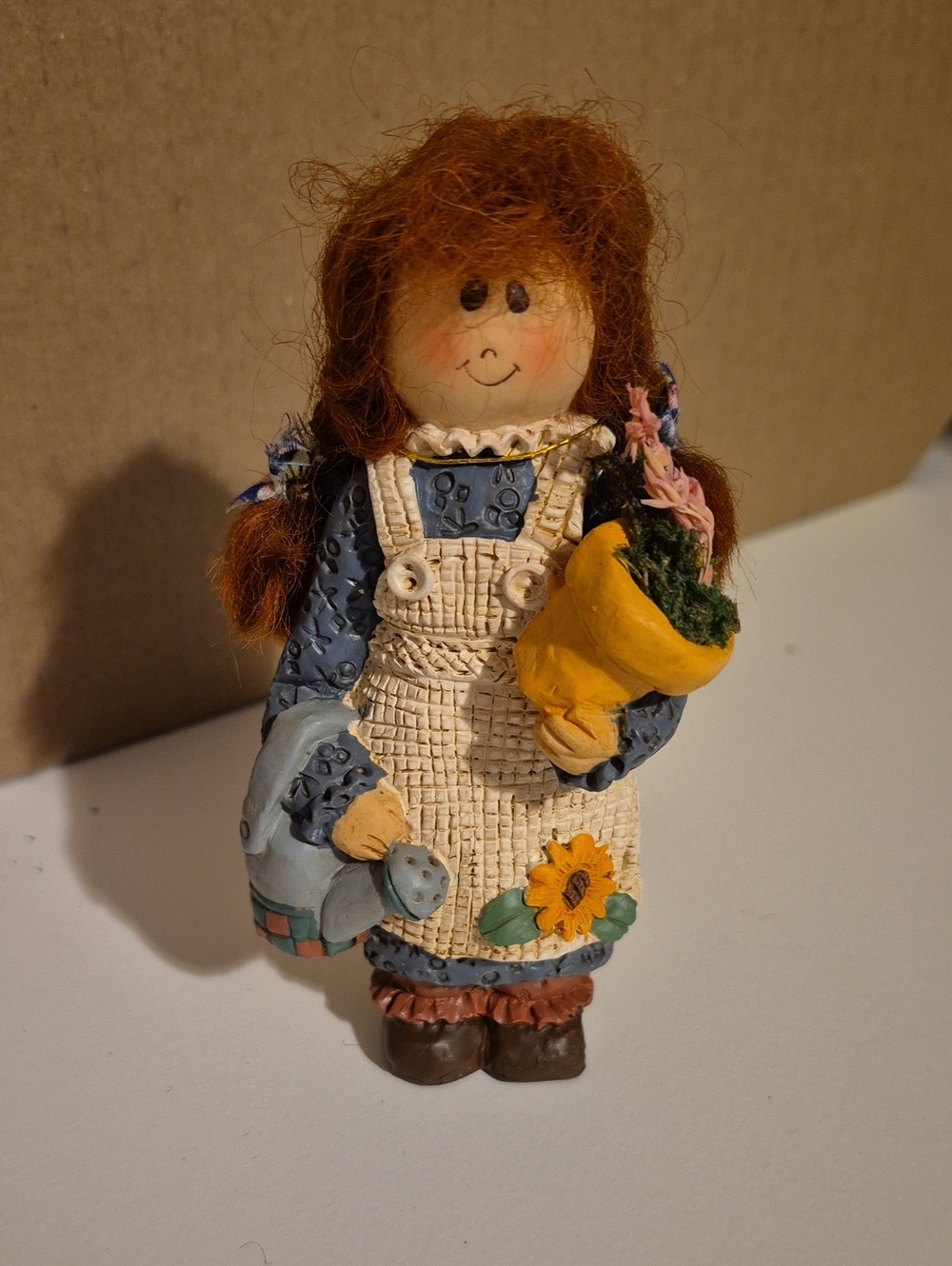 D8 Avon Vintage Garden Girl Figurine in Blue and Cream 5 Inch
